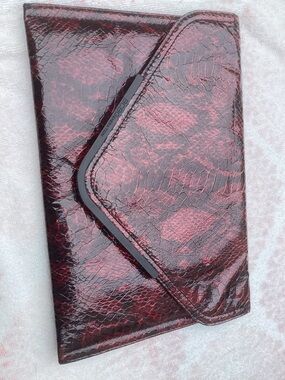 BCBGeneration Red and Black Snake-Embossed Clutch